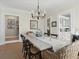 Inviting dining room featuring hardwood floors, classic decor, and easy access to other areas of the home at 549 Lakeshore Ne Dr, Atlanta, GA 30307