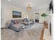 Bright living room with a fireplace, recessed lighting, and view to adjoining room at 549 Lakeshore Ne Dr, Atlanta, GA 30307