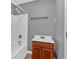 A bathroom with gray walls, a shower, and a vanity at 80 Holder St, Temple, GA 30179