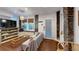 Cozy living room featuring exposed brick, natural light, and a comfortable seating arrangement at 1112 Austin Ne Ave, Atlanta, GA 30307