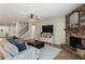 Comfortable living room with fireplace and hardwood floors at 455 Timberleaf Rd, Canton, GA 30115