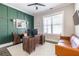 Stylish home office with dark wood furniture, and paneled accent wall at 1751 Stanwood Se Ave, Atlanta, GA 30317