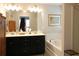 Bathroom features a double vanity, a soaking tub, and artwork on the wall at 5433 Cascade Sw Rdg, Atlanta, GA 30336