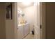 Functional laundry room with a stacked washer and dryer at 5433 Cascade Sw Rdg, Atlanta, GA 30336