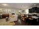 Inviting open living space showcasing a kitchen, seating area, and a dining space at 5433 Cascade Sw Rdg, Atlanta, GA 30336