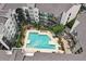Aerial view of an apartment complex featuring a large pool, lounge area, and beautifully landscaped courtyard at 747 Ralph Mcgill Ne Blvd # 326, Atlanta, GA 30312