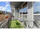 Relaxing outdoor balcony with a glass table, chairs, and a view of the neighborhood at 747 Ralph Mcgill Ne Blvd # 326, Atlanta, GA 30312