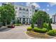 Beautiful building with lush landscaping and a circular driveway providing an attractive entrance at 747 Ralph Mcgill Ne Blvd # 326, Atlanta, GA 30312