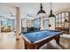 The stylish game room with a blue felt pool table, bar area and comfortable seating is well-lit at 747 Ralph Mcgill Ne Blvd # 326, Atlanta, GA 30312