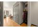 Inviting hallway featuring wood floors, coat closet, and open access to the dining area and living room at 747 Ralph Mcgill Ne Blvd # 326, Atlanta, GA 30312