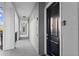 Exterior hallway featuring a secure dark wooden door with an intercom system and overhead lighting at 747 Ralph Mcgill Ne Blvd # 326, Atlanta, GA 30312