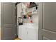 Functional laundry closet includes a washer, dryer, storage shelves for cleaning and laundry supplies at 747 Ralph Mcgill Ne Blvd # 326, Atlanta, GA 30312