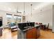 Combined living and kitchen space with a breakfast bar, dining table, and comfortable seating at 747 Ralph Mcgill Ne Blvd # 326, Atlanta, GA 30312