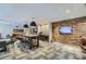 A contemporary lounge boasts multiple seating areas, a wall-mounted TV, and workspace at 747 Ralph Mcgill Ne Blvd # 326, Atlanta, GA 30312