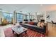 A modern lounge area features a plush sofa, accent chairs, and a garage door style window at 747 Ralph Mcgill Ne Blvd # 326, Atlanta, GA 30312
