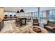 A spacious lounge area with comfortable seating, tables, and a computer workspace is well-designed at 747 Ralph Mcgill Ne Blvd # 326, Atlanta, GA 30312