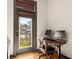 Home office area with a wooden desk, black leather chair, and a large window with natural light at 747 Ralph Mcgill Ne Blvd # 326, Atlanta, GA 30312