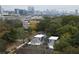 Modern home design showcased from above, surrounded by mature trees, with neighborhood views at 1186A Francis Nw St, Atlanta, GA 30318