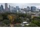 Picturesque cityscape with residential areas nestled amidst lush greenery, showcasing a harmonious blend of nature and urban living at 1186A Francis Nw St, Atlanta, GA 30318