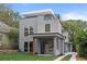 Beautifully designed home featuring modern architecture, a cozy porch, and lovely landscaping at 1186A Francis Nw St, Atlanta, GA 30318