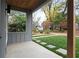 Inviting front porch with stone pathway, offering a peaceful view of the neighborhood at 1186A Francis Nw St, Atlanta, GA 30318