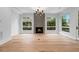 Bright, open living area with fireplace, hardwood floors, and ample natural light at 1186A Francis Nw St, Atlanta, GA 30318