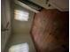 Bare bedroom featuring hardwood floors, two windows with blinds, and a ceiling fan at 2628 Northview Ave, Decatur, GA 30032