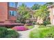 Beautiful building exterior with colorful flower beds and a walkway leading to the entrance at 5306 Brooke Ridge Dr, Atlanta, GA 30338