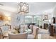 Bright, open-concept living and dining area with modern decor and abundant natural light at 5306 Brooke Ridge Dr, Atlanta, GA 30338