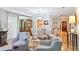 Open living area featuring hardwood floors, comfortable seating, and stylish decor at 5306 Brooke Ridge Dr, Atlanta, GA 30338