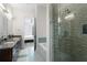 Bathroom boasting a glass-enclosed shower, soaking tub and modern finishes at 200 N Highland Ne Ave # 207, Atlanta, GA 30307