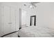 Bright bedroom featuring a ceiling fan, closet, and plenty of natural light at 200 N Highland Ne Ave # 207, Atlanta, GA 30307