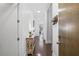 Inviting hallway with hardwood floors, modern lighting, and stylish decor at 200 N Highland Ne Ave # 207, Atlanta, GA 30307