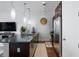 Stylish kitchen featuring stainless steel appliances, granite countertops, and dark wood cabinets at 200 N Highland Ne Ave # 207, Atlanta, GA 30307