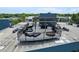 Spacious rooftop patio with outdoor seating, a fire pit, and shaded structure at 200 N Highland Ne Ave # 207, Atlanta, GA 30307