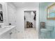 Bathroom featuring a vanity, toilet, shower, and a walk-in closet at 100 Reed St, Canton, GA 30114