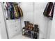Walk-in closet featuring organized storage for clothing and shoes at 100 Reed St, Canton, GA 30114