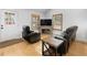 Bright living room featuring hardwood floors, a fireplace and comfortable seating at 100 Reed St, Canton, GA 30114