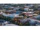 An aerial view of the area shows fall colors surrounding this property near commercial buildings and plentiful amenities at 1186B Francis Nw St, Atlanta, GA 30318