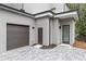 Exterior showcasing garage, private entry door and pavers on a modern gray home at 1186B Francis Nw St, Atlanta, GA 30318