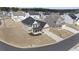 Home with a well-manicured lawn and a neutral exterior from an aerial view at 250 Riverclub Rd, Acworth, GA 30101