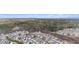 A panoramic view of a residential neighborhood nestled among lush greenery and rolling hills at 250 Riverclub Rd, Acworth, GA 30101