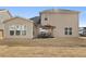 Backyard features a patio with seating and a well-maintained lawn at 250 Riverclub Rd, Acworth, GA 30101