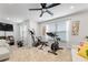 Exercise room with gym equipment, TV, and comfortable sitting area at 250 Riverclub Rd, Acworth, GA 30101