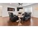 Cozy living room with hardwood floors, a fireplace, and comfortable leather reclining seating at 250 Riverclub Rd, Acworth, GA 30101