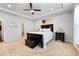 Inviting main bedroom with tray ceiling, carpet, and ample natural light, creating a relaxing space at 250 Riverclub Rd, Acworth, GA 30101