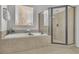 Bathroom featuring a soaking tub, tiled surround, and a glass-enclosed shower at 4050 Preserve Crossing Ln, Cumming, GA 30040