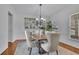 Formal dining room with modern chandelier and stylish decor at 4050 Preserve Crossing Ln, Cumming, GA 30040