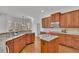 Modern kitchen with granite countertops, stainless steel appliances, and center island at 4050 Preserve Crossing Ln, Cumming, GA 30040
