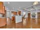 Beautiful kitchen with an island and adjoining rooms offering a large open floor plan at 4050 Preserve Crossing Ln, Cumming, GA 30040